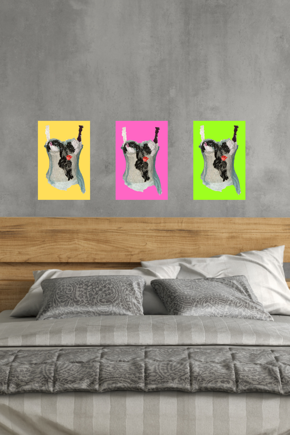 Three colorful wall art pieces on a gray wall above a bed with gray bedding.