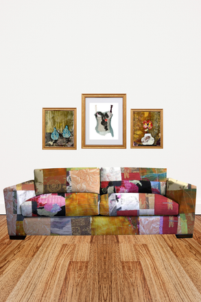 Colorful patchwork sofa with framed artworks on a white wall.