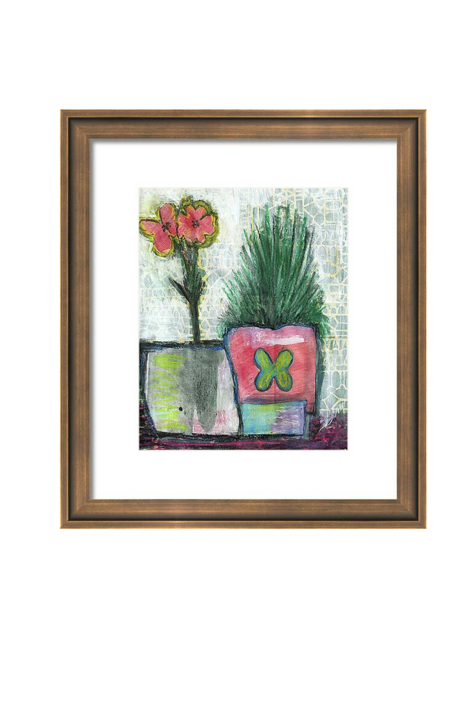 Framed artwork of potted plants with a colorful abstract background