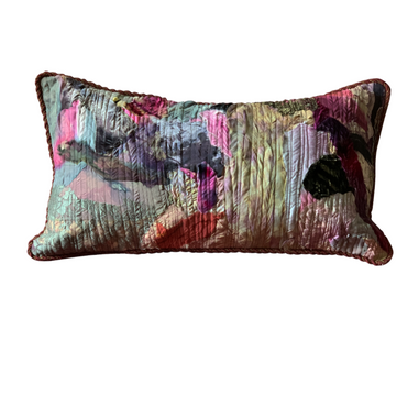 Multicolored textured pillow on a white background