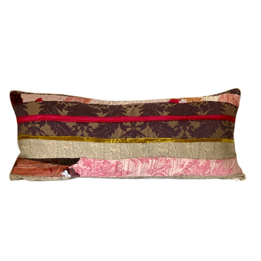 Decorative pillow with multicolored pattern on a white background