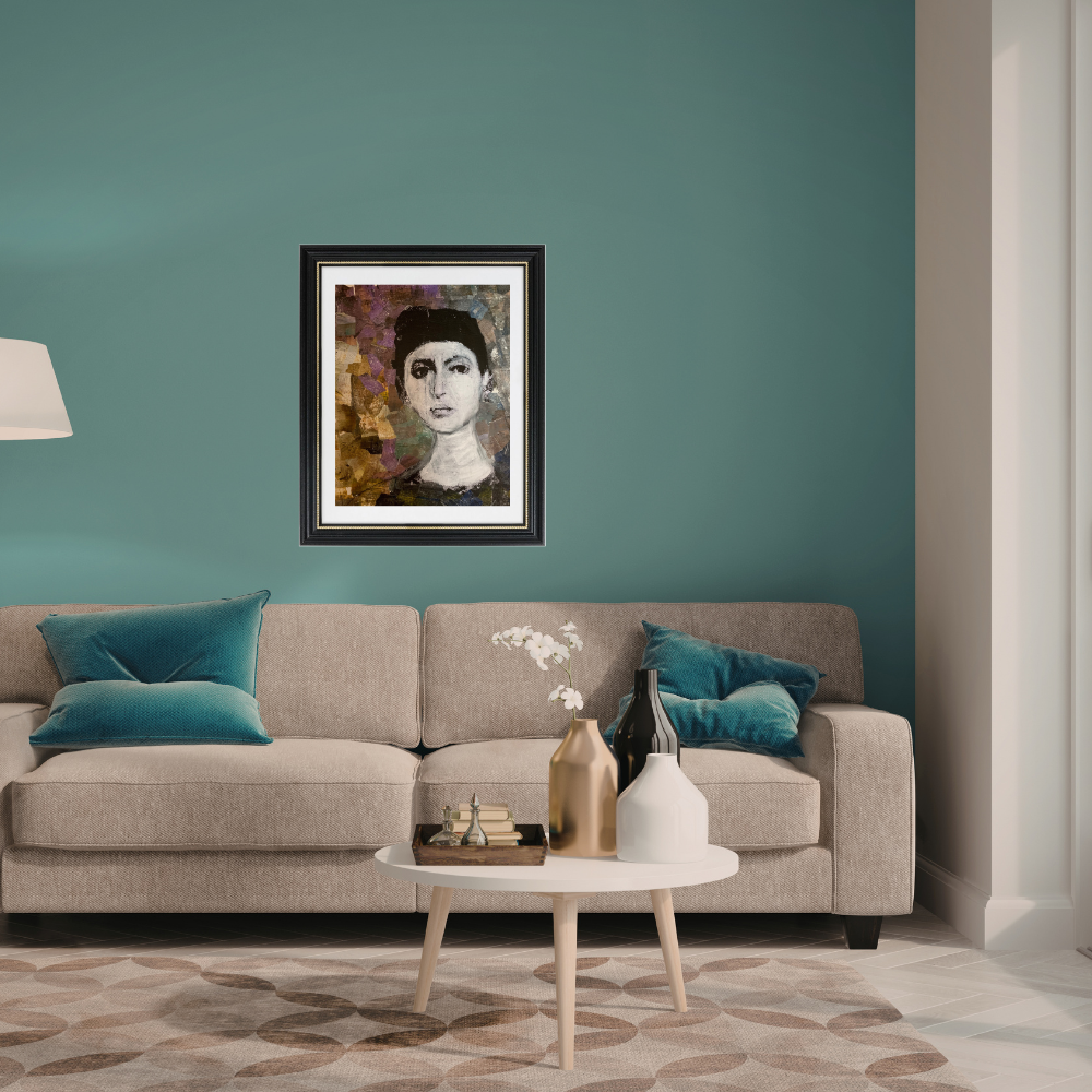 Colorful Portraits Fine Art Prints. Living room with a gray sofa, teal pillows, and a framed portrait on a teal wall.