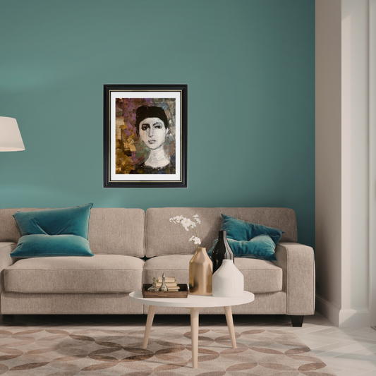Colorful Portraits Fine Art Prints. Living room with a gray sofa, teal pillows, and a framed portrait on a teal wall.