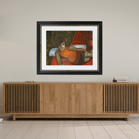 Framed painting on a wall above a wooden sideboard