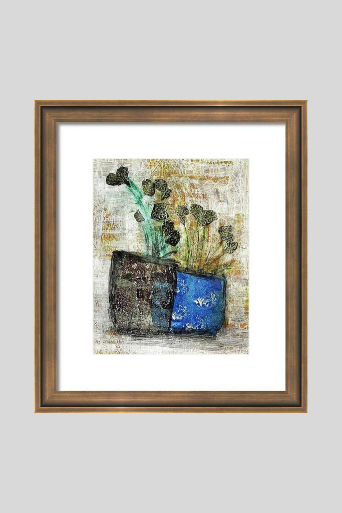 Framed artwork of a plant in a pot on a white background