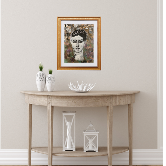 Colorful Portraits Fine Art Prints. Wooden console table with decorative items against a white wall with a framed portrait above.