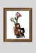 Framed artwork of abstract flowers with a wooden frame on a white background