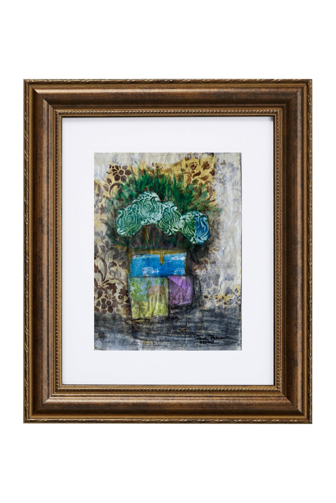Framed artwork with a colorful floral arrangement on a textured background