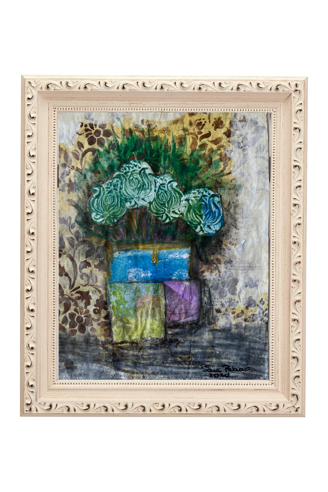 Framed abstract painting with a decorative white frame