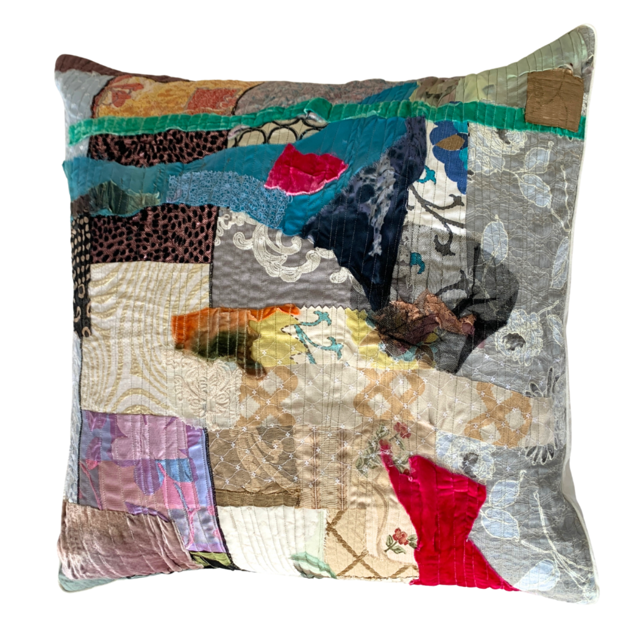Multicolored patchwork pillow on a white background