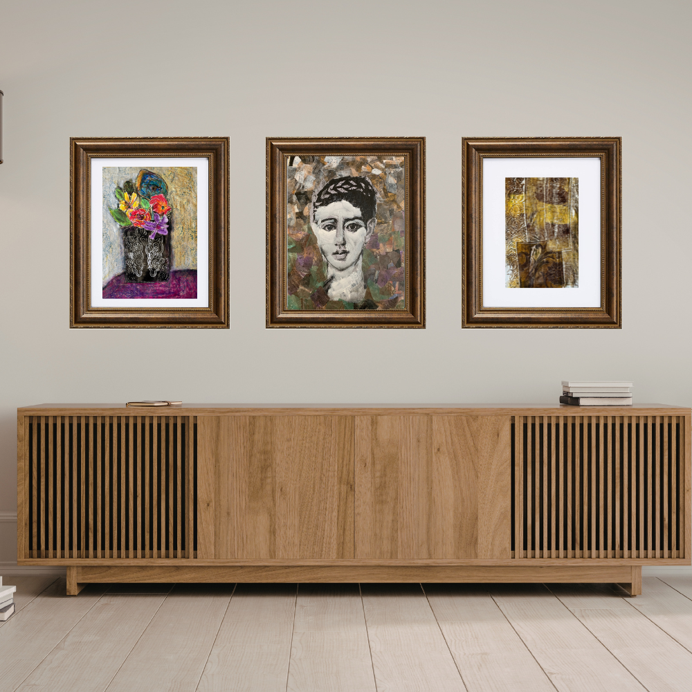 Three framed artworks above a wooden sideboard in a room.
