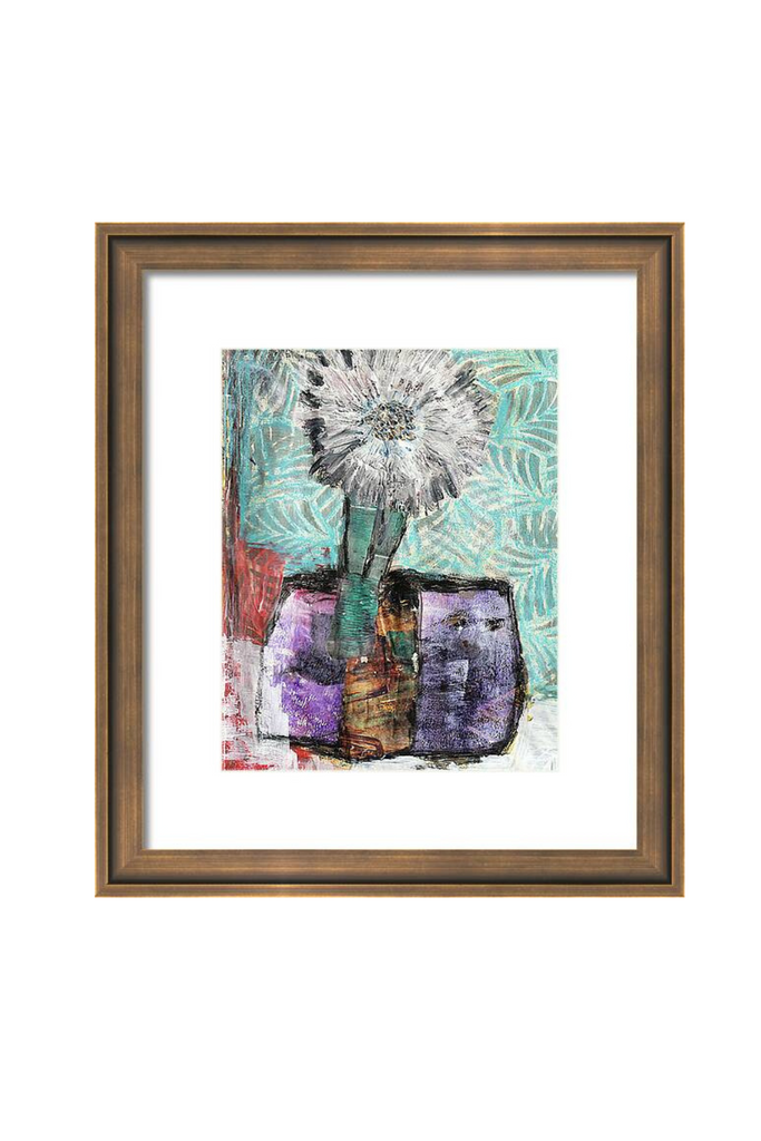 Framed artwork with a dandelion and abstract design on a white background