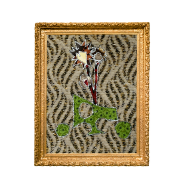 Decorative wall art with a gold frame, zebra print background, and abstract design.