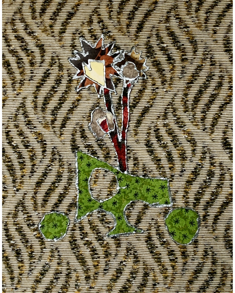 Decorative brooch with floral design on a textured fabric background