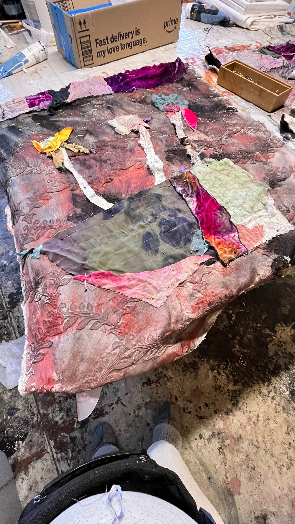 detail of textile art collage: abstract flowers