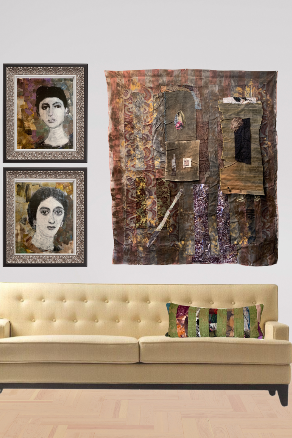 A styled interior scene showing a cream tufted sofa against a light gray wall, with two framed portrait paintings on the left and a large abstract textile wall hanging on the right. A colorful striped pillow rests on the sofa.
