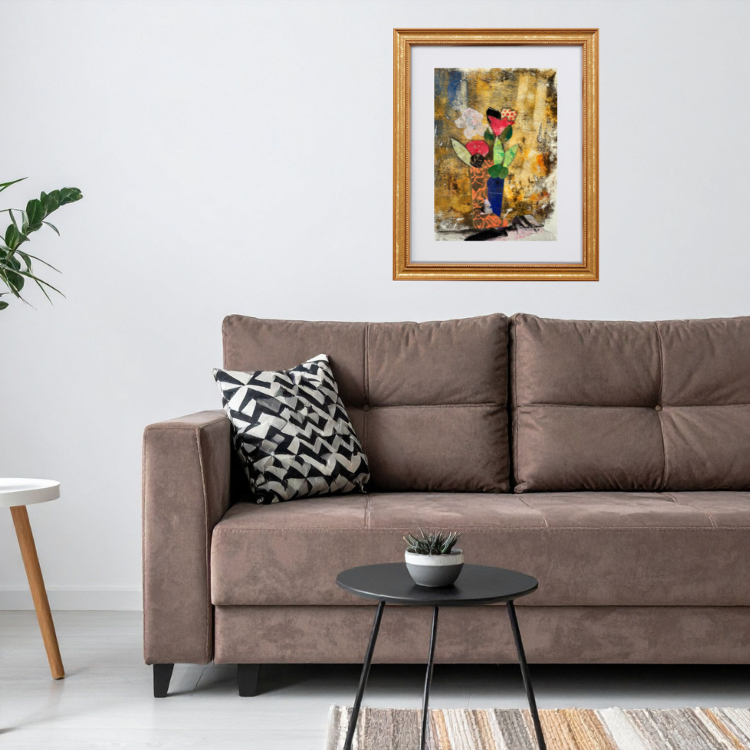  Floral Wall Fine Art Print. Living room with a brown sofa, decorative pillow, small table, and framed artwork on the wall.