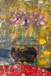 abstract pink floral collage in a vase with a gold background
