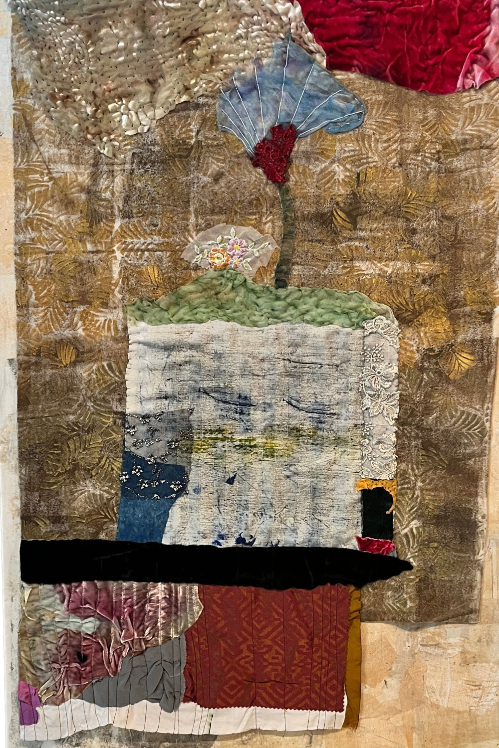 Collage art with textured background and floral elements