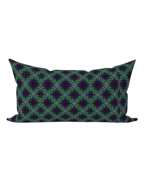 Decorative pillow with green and black geometric pattern on a white background