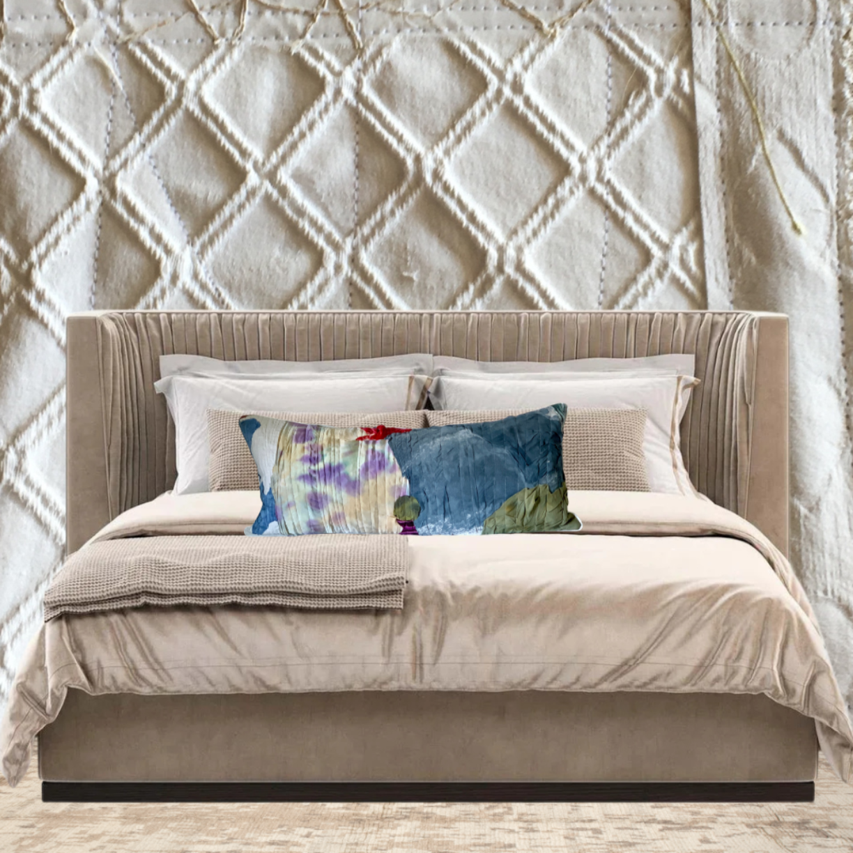 Beige upholstered bed with colorful pillows against a textured wall.