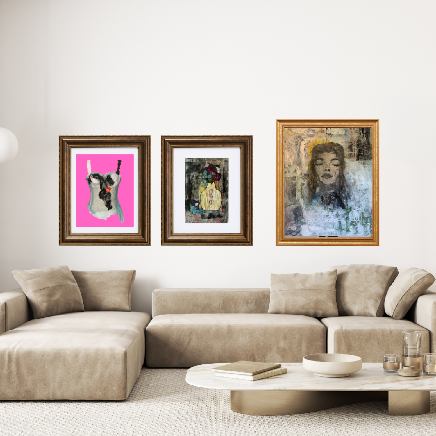 Wall art. Living room with a beige sectional sofa and three framed artworks on the wall.