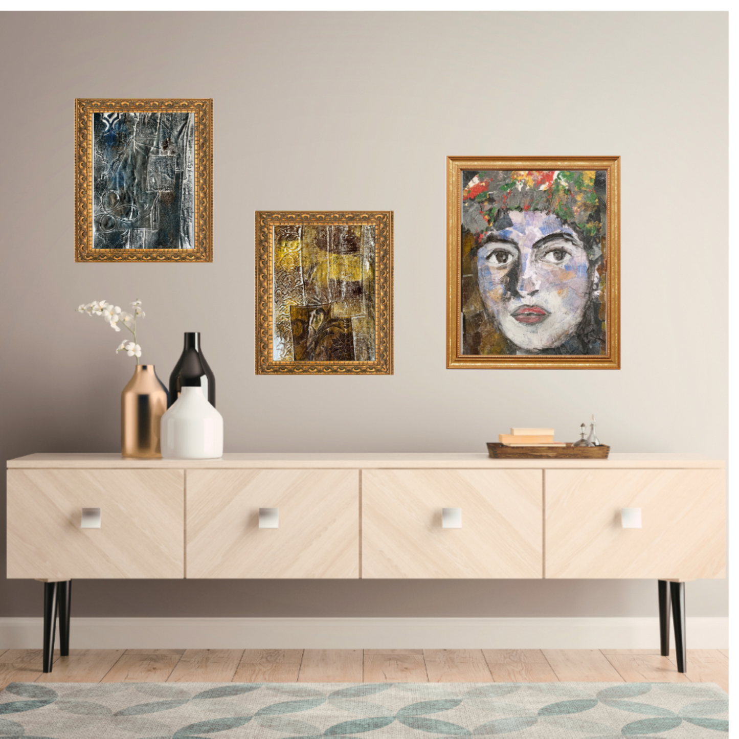 Wall art. Framed artworks on a wall above a wooden cabinet with decorative items.