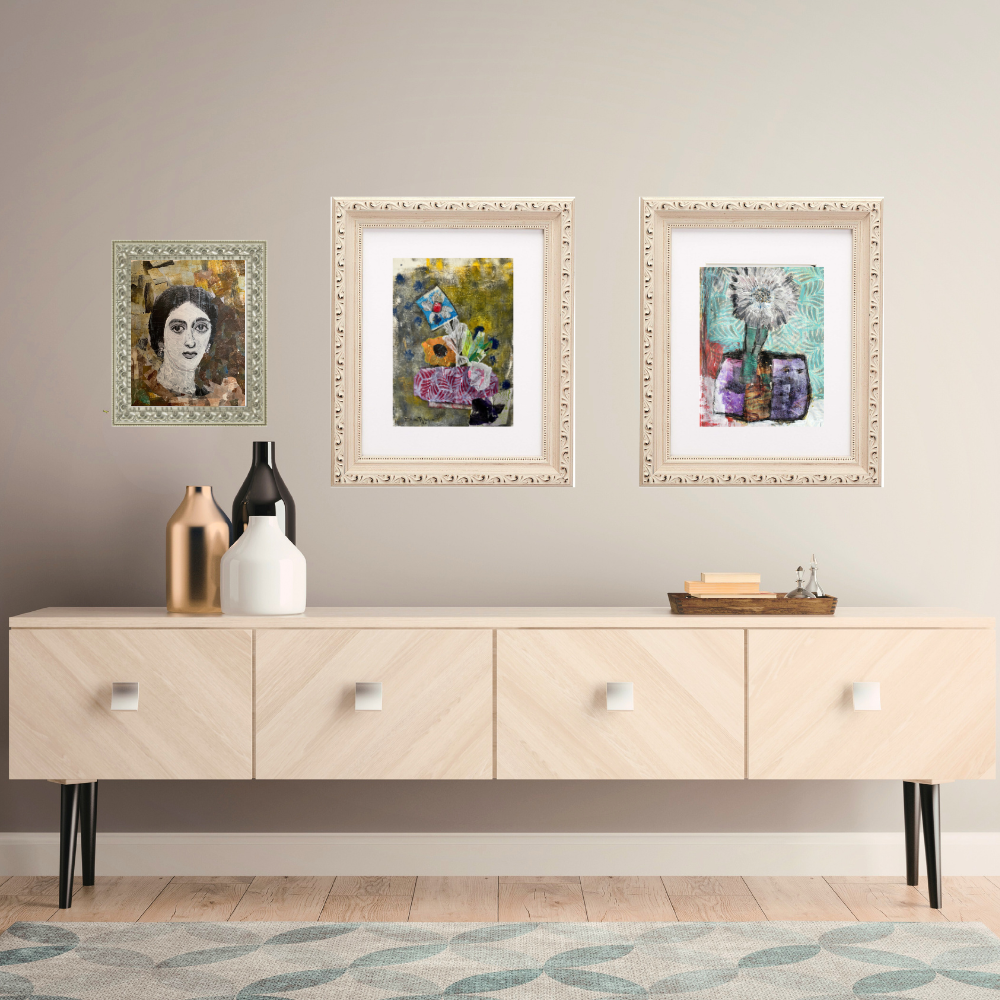 Floral Wall Fine Art Print. Three framed artworks above a wooden console table with decorative items.