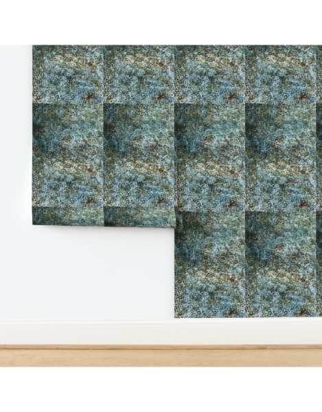 Textured green and brown patterned wallpaper on a white wall with wooden floor.