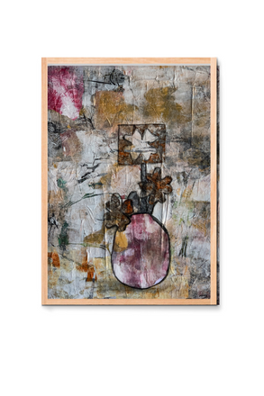 Abstract art piece with a wooden frame on a white background