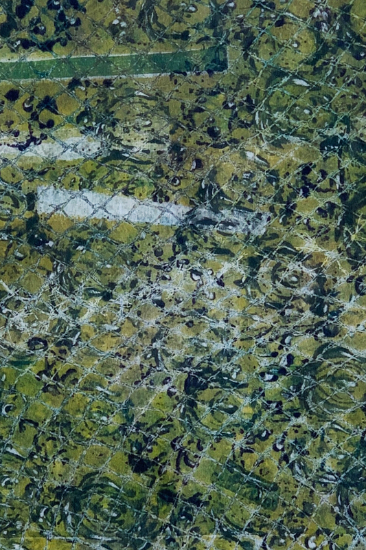 Close-up of a green and black marbled surface
