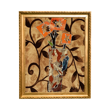 Decorative wall art with floral design in a gold frame on a beige background