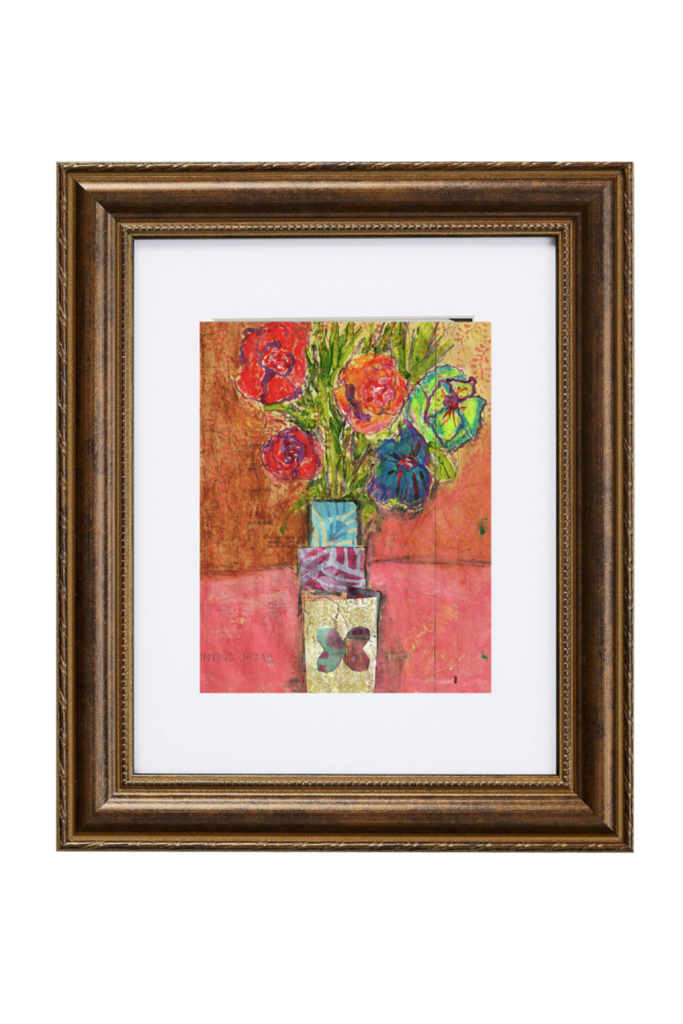Framed artwork of flowers on a white background