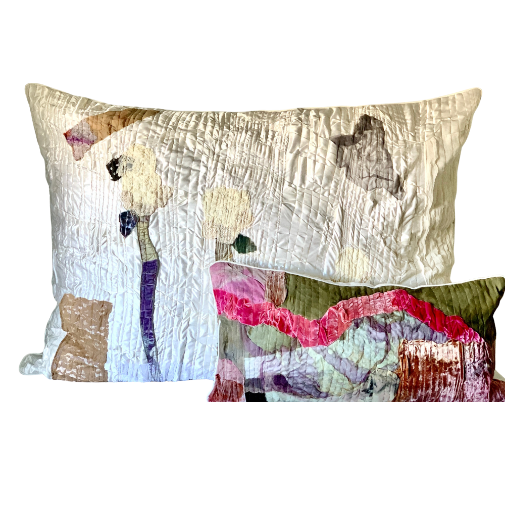 Two decorative pillows with abstract patterns on a white background