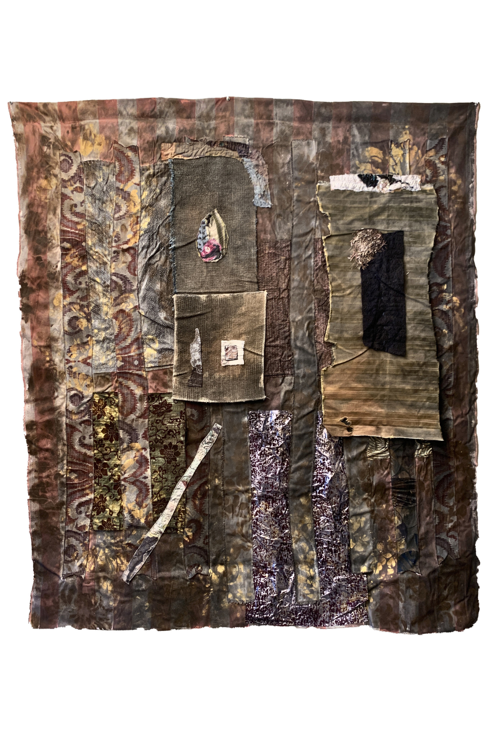 An abstract mixed-media textile artwork featuring layered patches of brown, black, and muted gold fabrics with stitched textures and torn fabric details, presented flat against a white background.