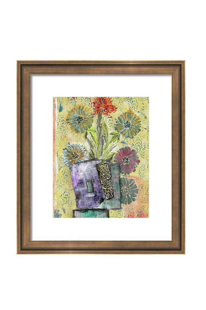 Framed artwork of a colorful floral arrangement on a white background