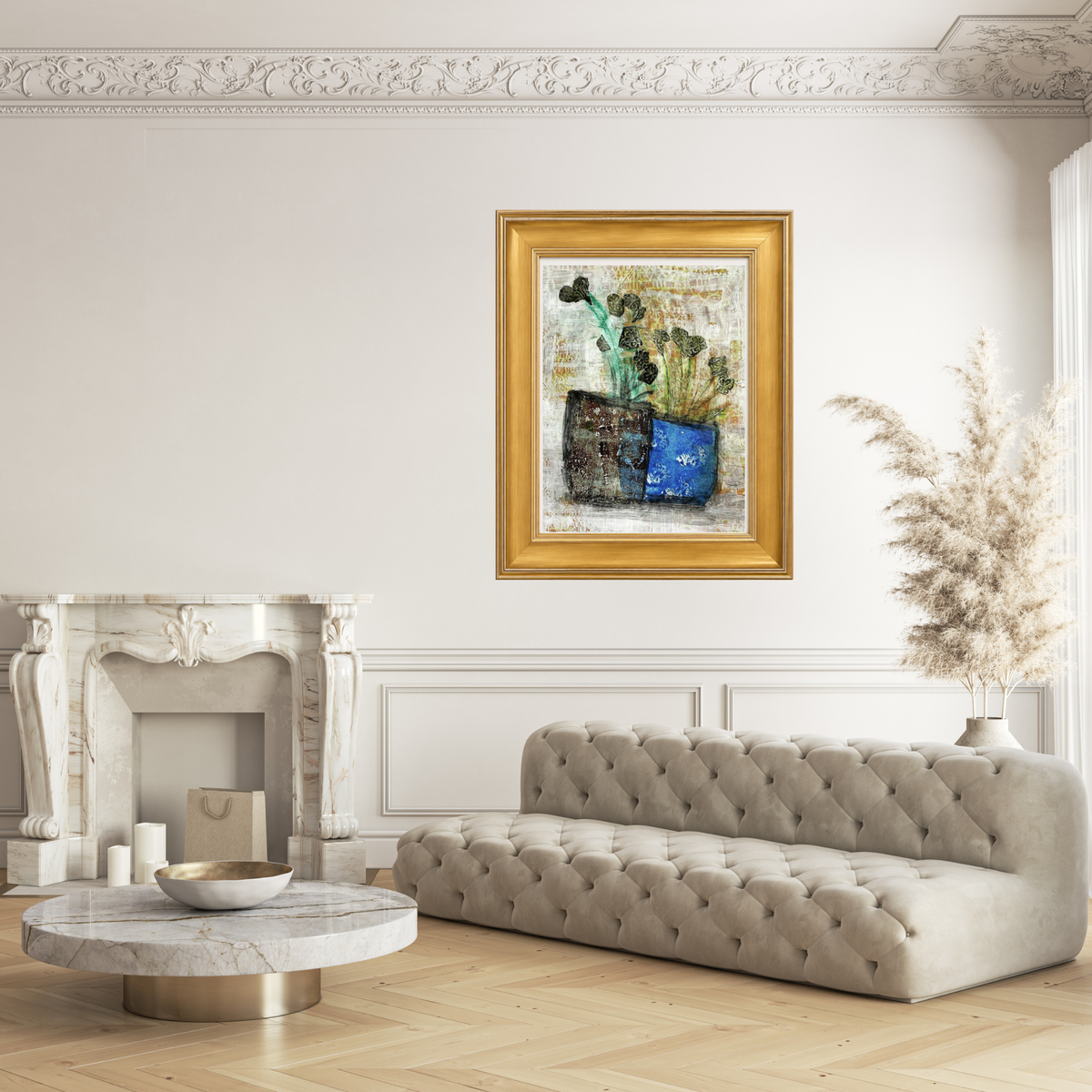 A framed abstract painting featuring a blue vase with green and gold elements, displayed on a white wall above a tufted beige sofa in a bright, modern living room.