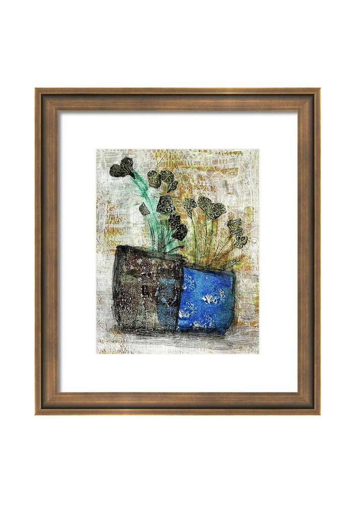 Framed artwork with a blue pot and green plant on a textured background