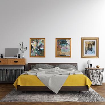 Modern bedroom with a bed, nightstands, and wall art.