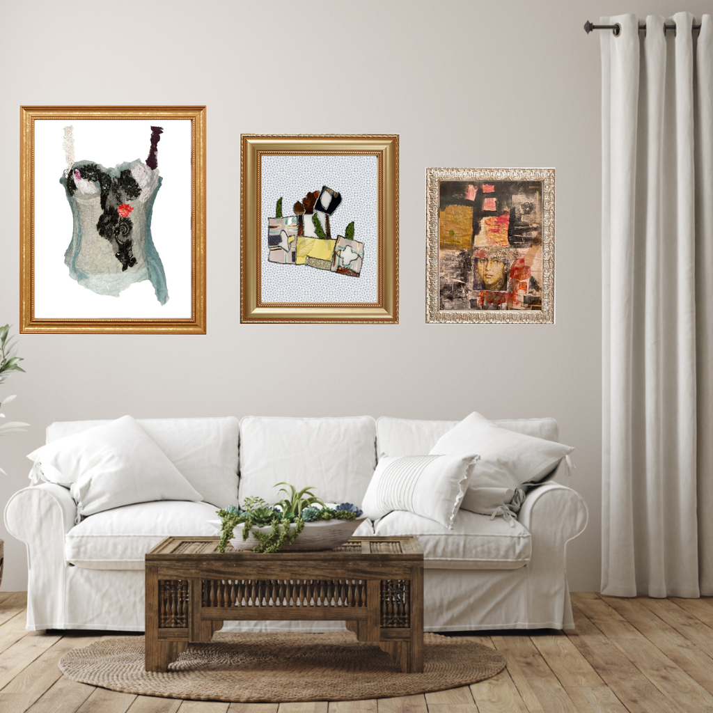 Living room with a white sofa, wooden coffee table, and three framed artworks on the wall.