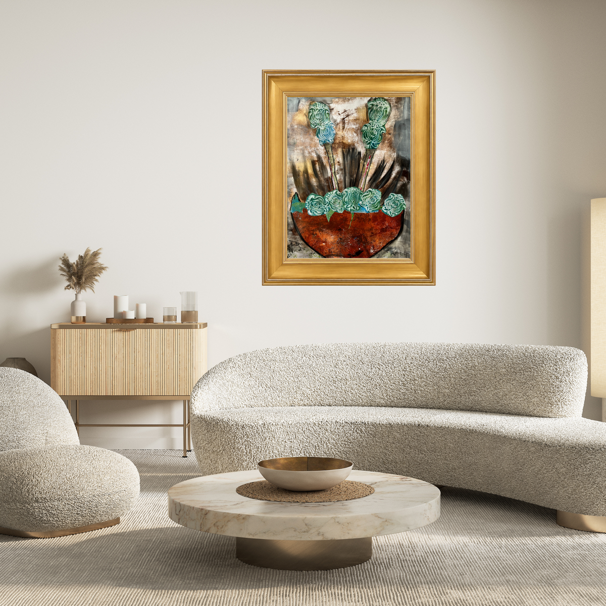 Framed abstract art print featuring a textured rust-red heart shape with turquoise floral elements and dark vertical strokes on a mottled gray-brown background, housed in a gold frame in a modern living room.