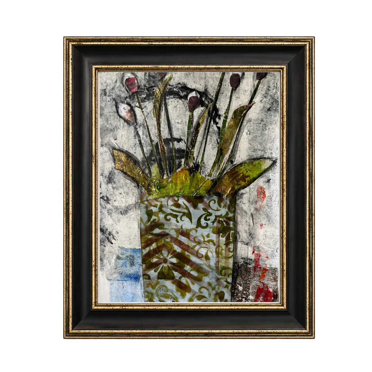 Framed mixed-media floral artwork featuring a patterned vase with stems and leaves, set within a  black frame with gold detailing, shown against a plain white background.