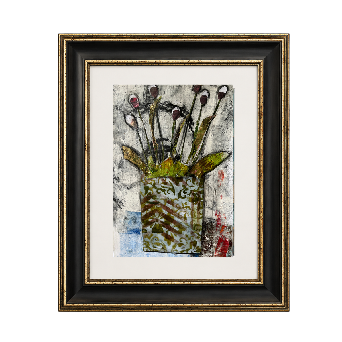 Framed mixed-media floral artwork featuring a patterned vase with stems and leaves, set within a white mat and a black frame with gold detailing, shown against a plain white background.