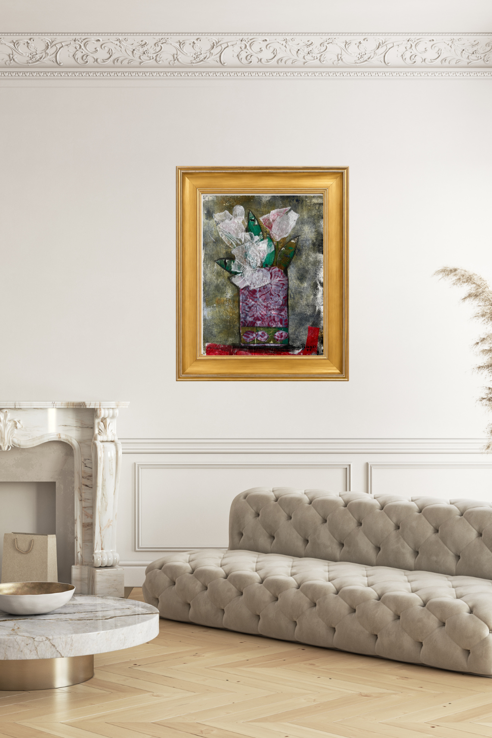 A framed still life collage of white tulips in a purple vase, set in a gold frame and displayed on a white wall above a tufted beige sofa in a classic living room setting.