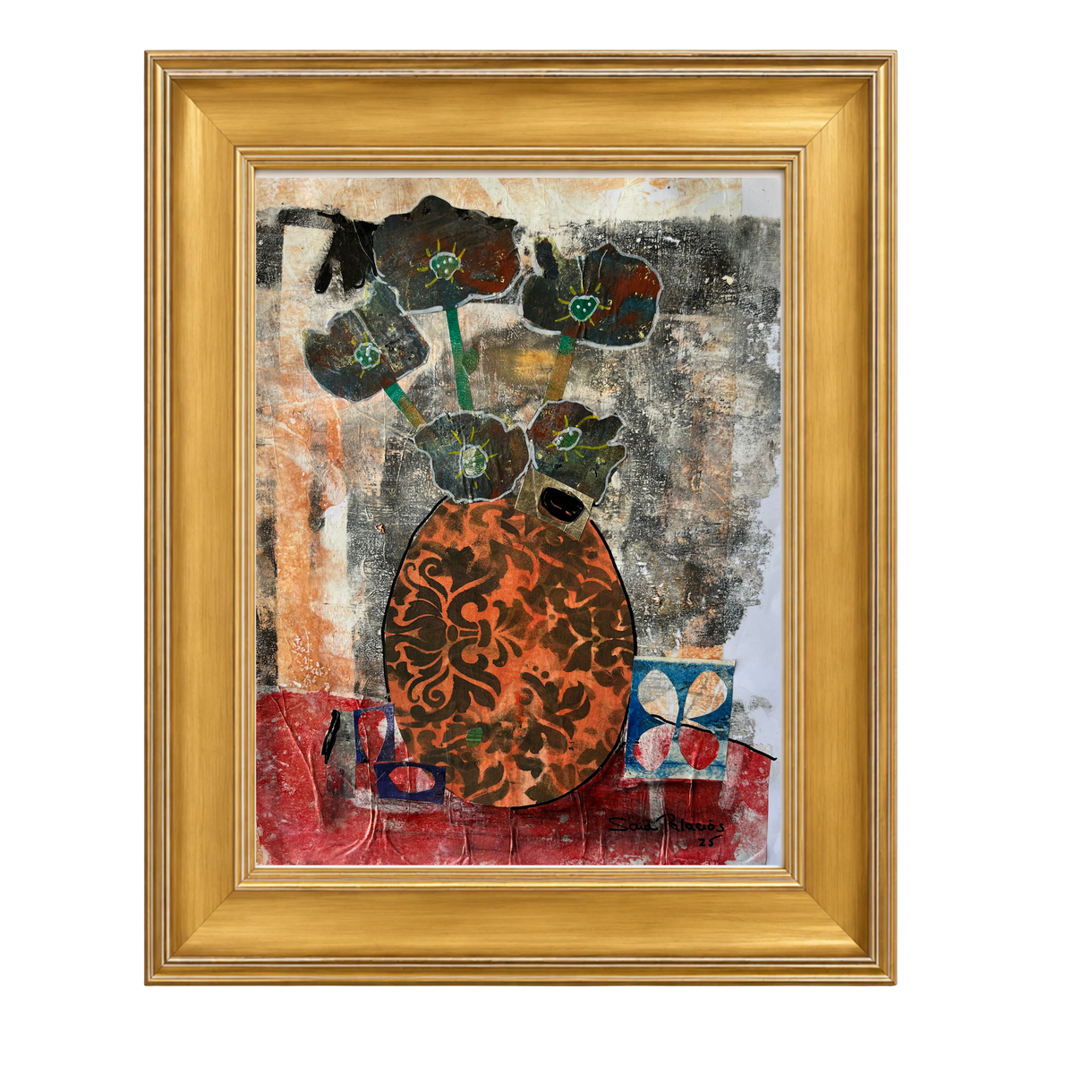 Framed abstract art print featuring a stylized orange and black patterned vase with dark flowers on a textured multicolor background, enclosed a gold frame.