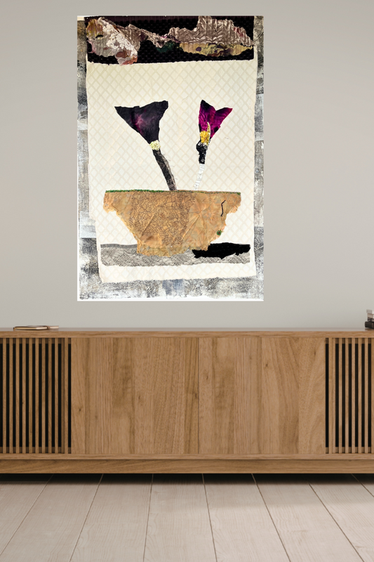 Abstract art piece on a wall above a wooden console table.