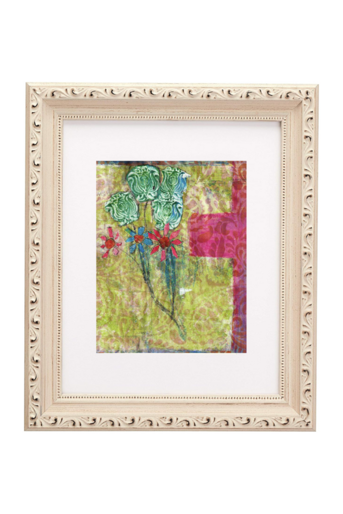 Framed artwork with floral design on a white background