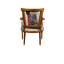 Verite Chair by Sara Palacios – a hand-painted, gold-framed accent chair upholstered with a bold patchwork textile featuring abstract black patterns, warm ochre tones, and striking fuchsia accents.