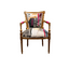 Verite Chair by Sara Palacios – a hand-painted, gold-framed accent chair upholstered with a bold patchwork textile featuring abstract black patterns, warm ochre tones, and striking fuchsia accents.