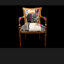 Verite Chair by Sara Palacios – a hand-painted, gold-framed accent chair upholstered with a bold patchwork textile featuring abstract black patterns, warm ochre tones, and striking fuchsia accents.